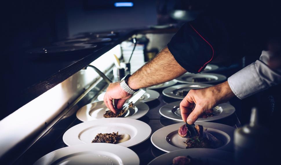 Free Image of Chef Plating Food in Oven 