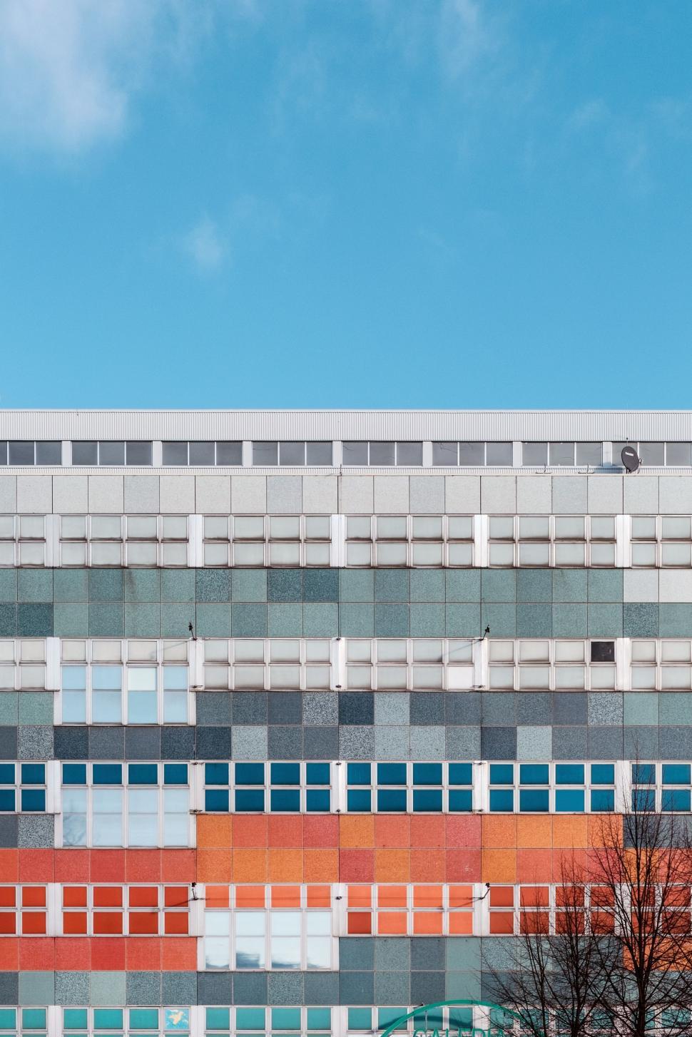 Free Image of Modern Office Building With Numerous Windows 