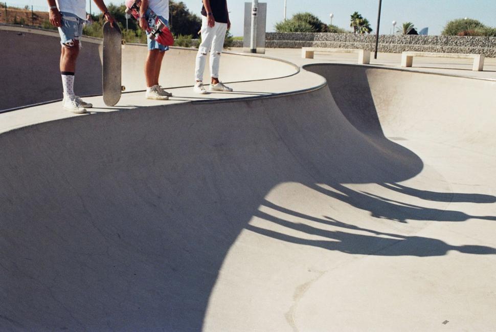 Free Image of Group of People Riding Skateboards at a Skate Park 