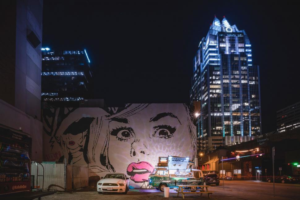 Free Image of Mural of a Womans Face on a Building 