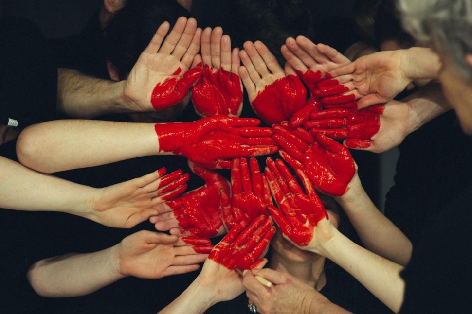 Free Image of Group of People Forming Heart Shape With Hands 