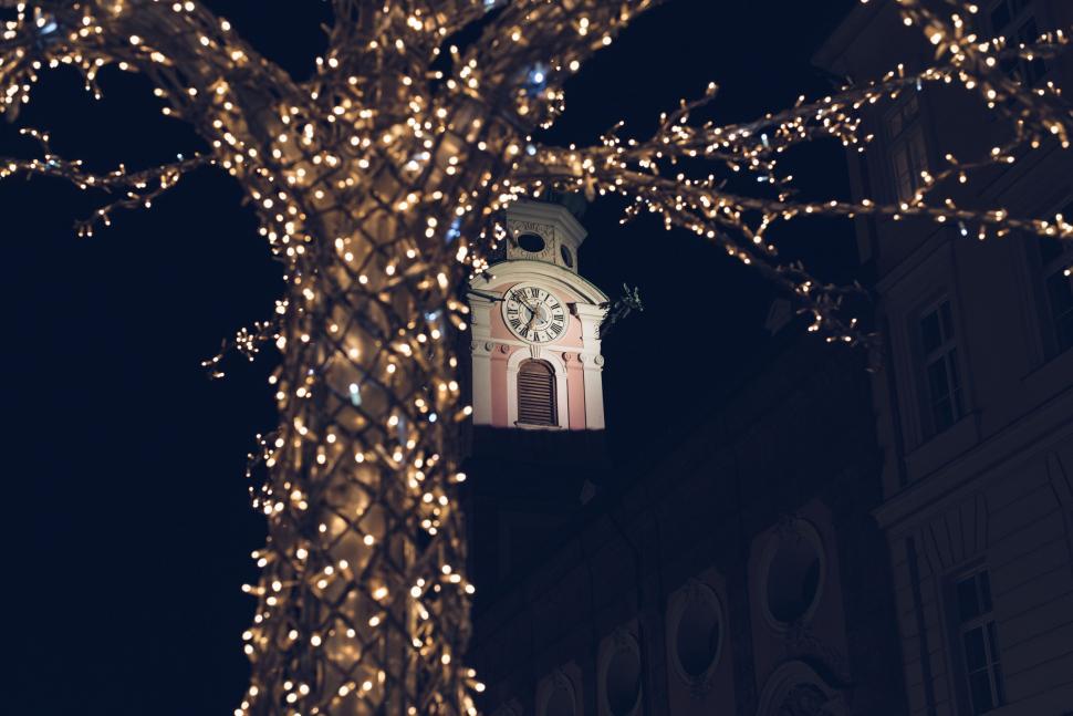 Free Image of Illuminated Tree With Clock Tower 