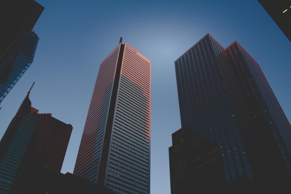 Free Image of Group of Tall Buildings Against Blue Sky 