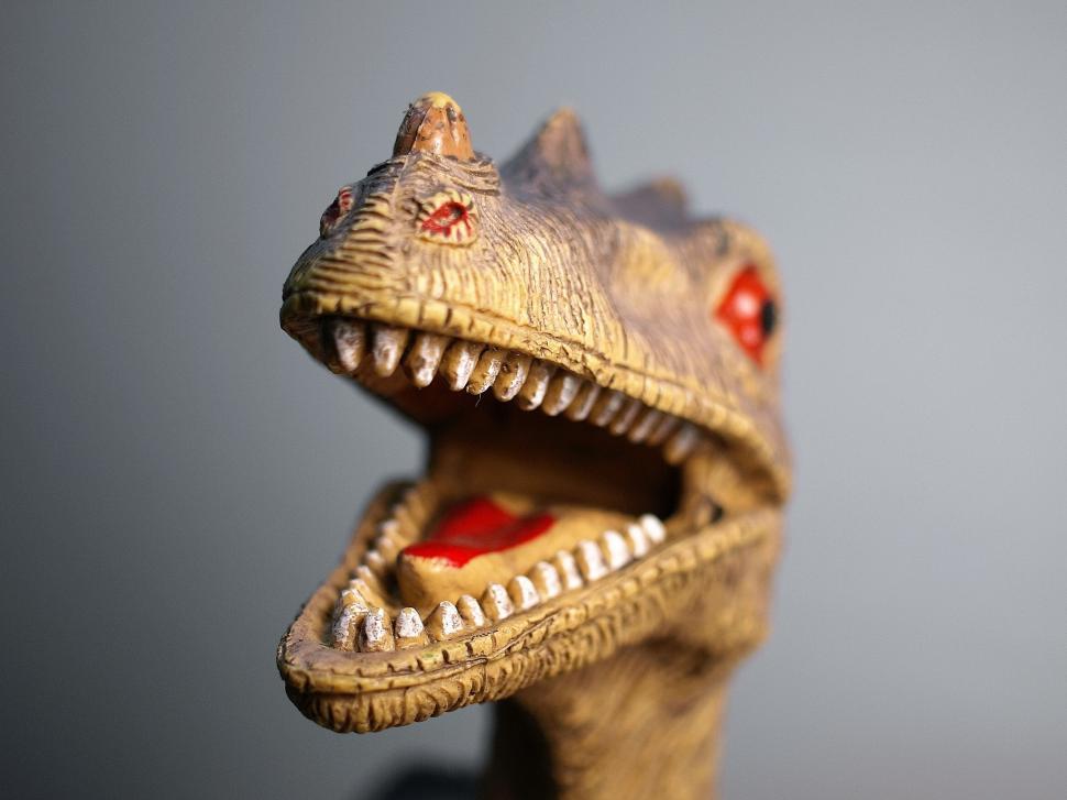 Free Image of Close Up of a Toy Dinosaur With Its Mouth Open 