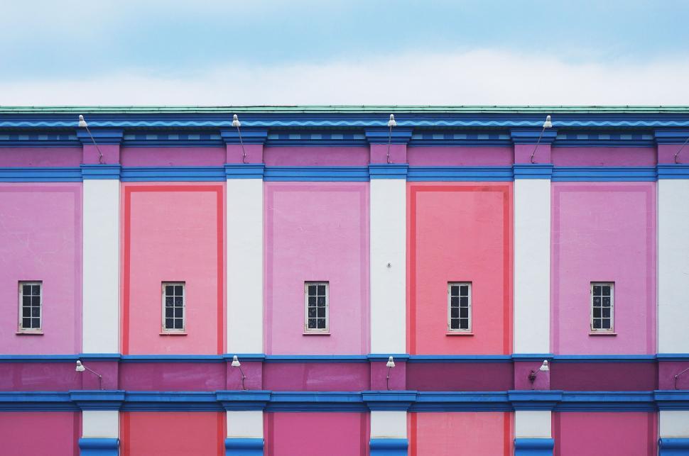 Free Image of Multicolored Building Against Sky Background 