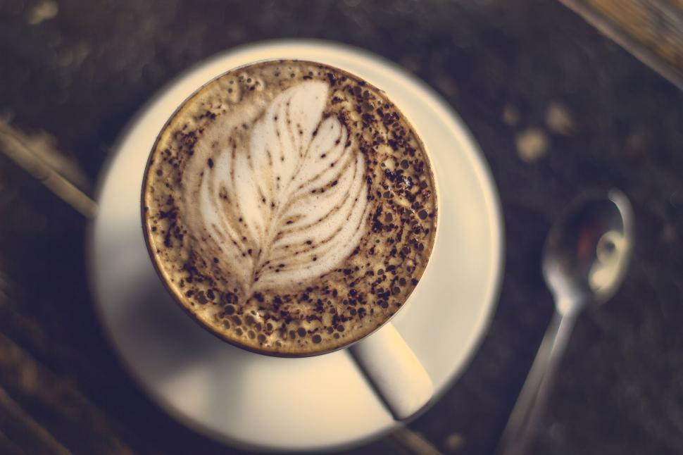 Free Image of A Cappuccino With Spoon on Saucer 