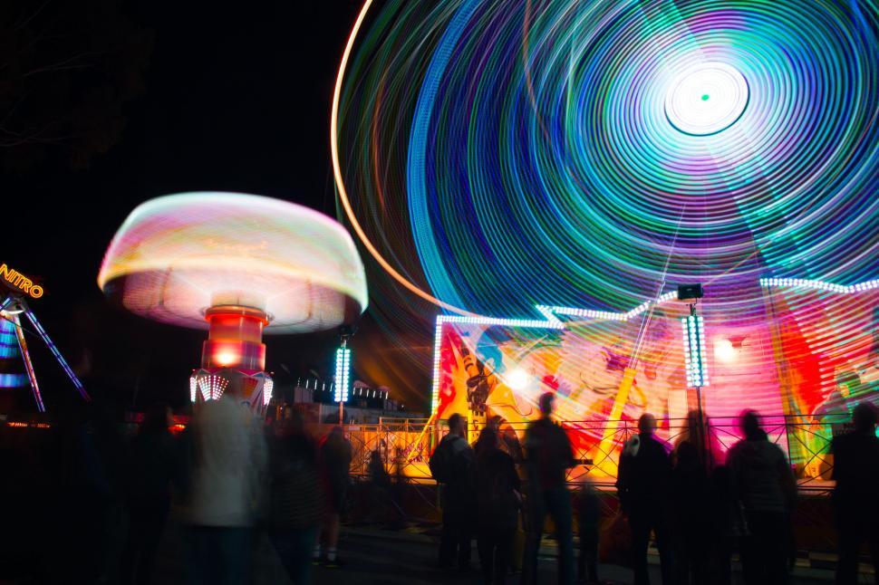 Free Image of Group of People Around Carnival Ride at Night 