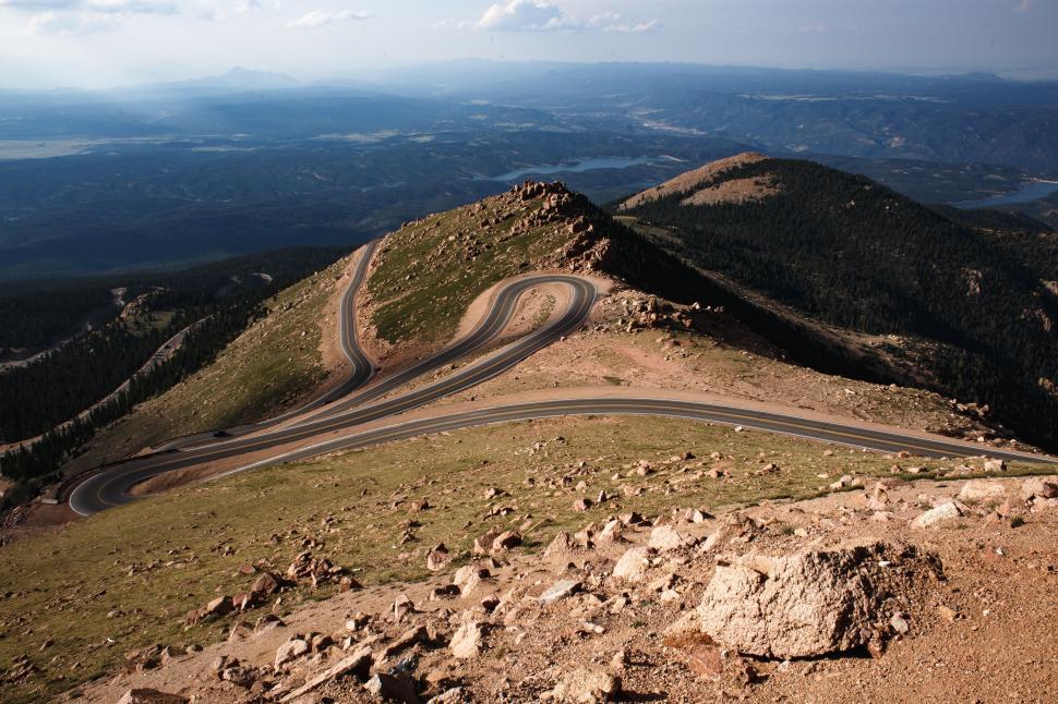 Free Image of Overlooking a Winding Road From the Summit 