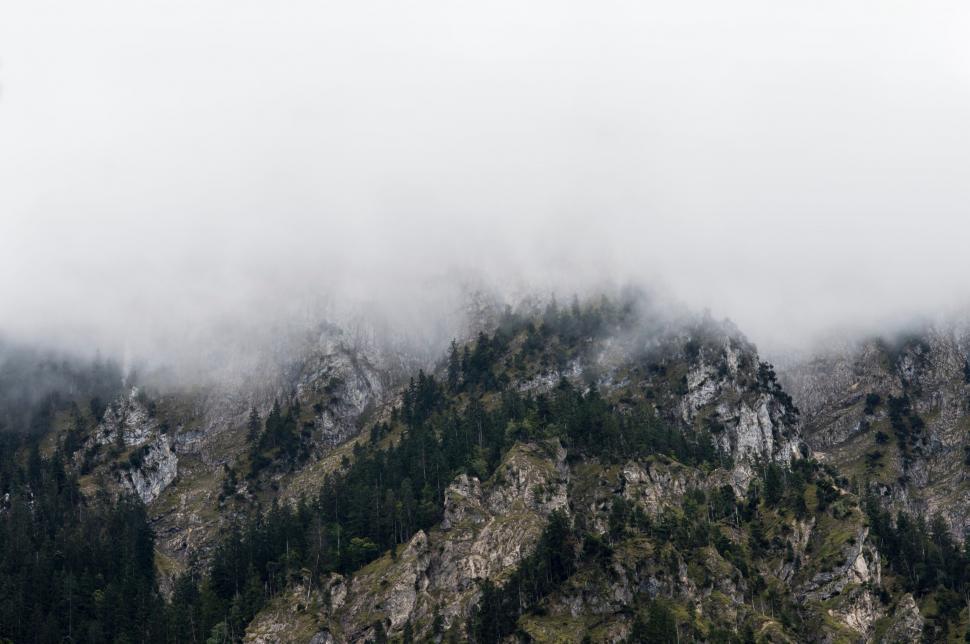 Free Image of Mountain Covered in Fog 