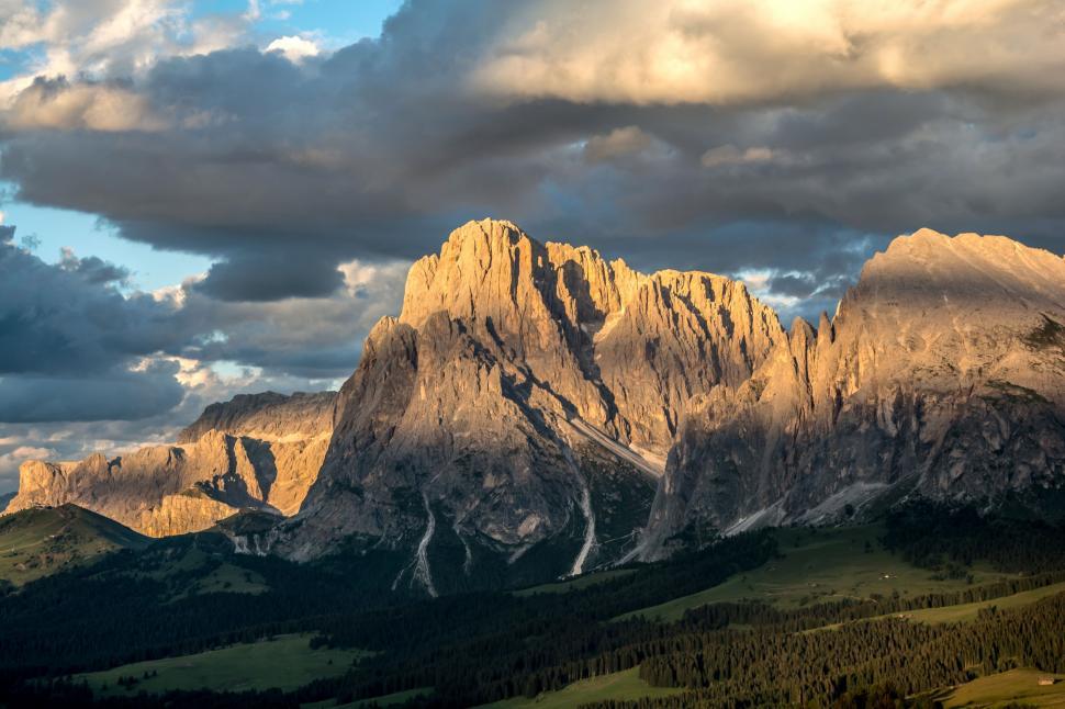 Free Image of Majestic Mountain Range With Clouds in the Sky 