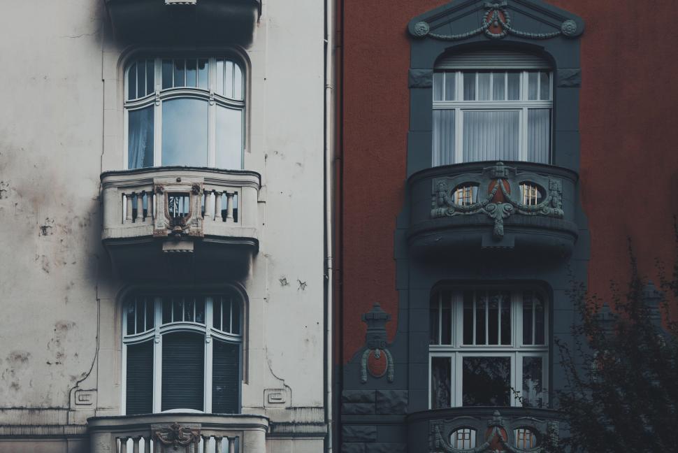 Free Image of Two Buildings With Balconies Facing Each Other 