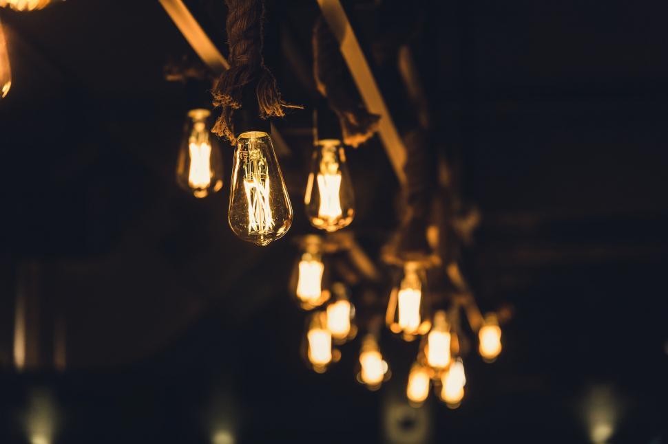 Free Image of Cluster of Light Bulbs Hanging From a Ceiling 