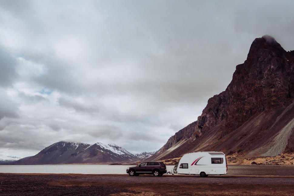 Free Image of Two Vans Parked on Side of Road 