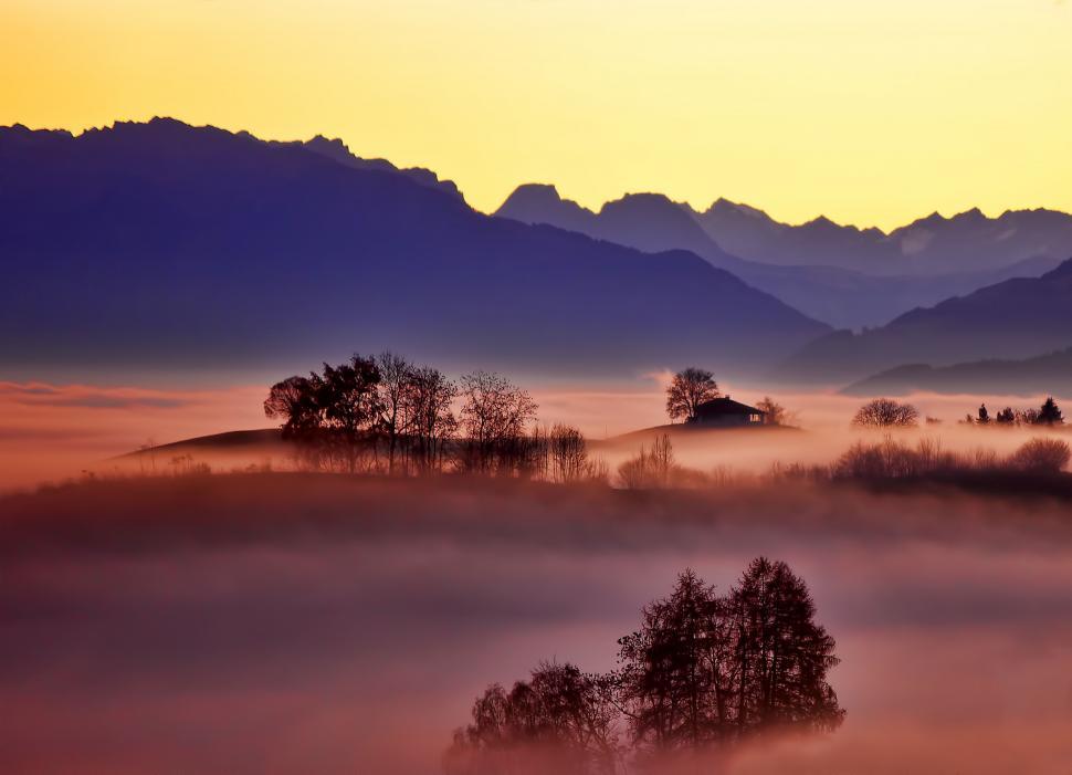 Free Image of Foggy Landscape With Distant Mountains 
