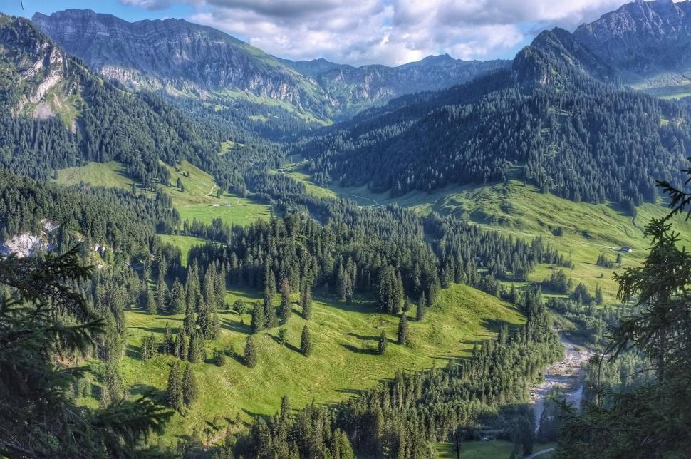 Free Image of Majestic Valley Surrounded by Mountains 