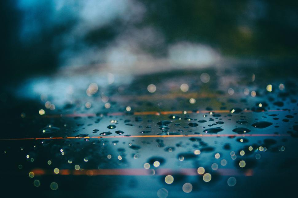 Free Image of Close-Up of Water Droplets on Surface 