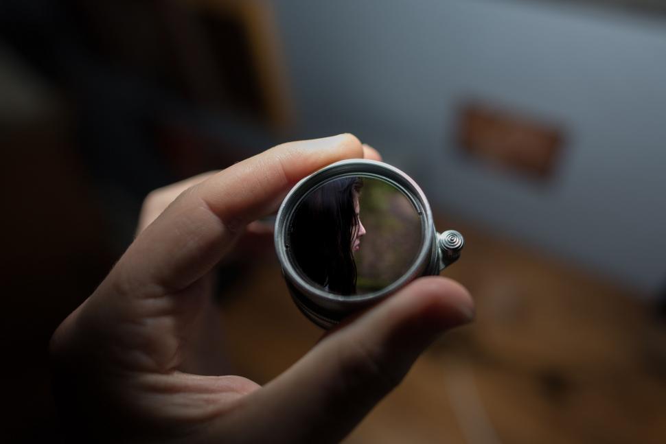Free Image of Person Holding Ring in Hand 