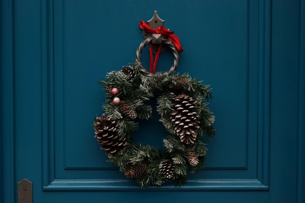 Free Image of Christmas Wreath Adorns Blue Door 