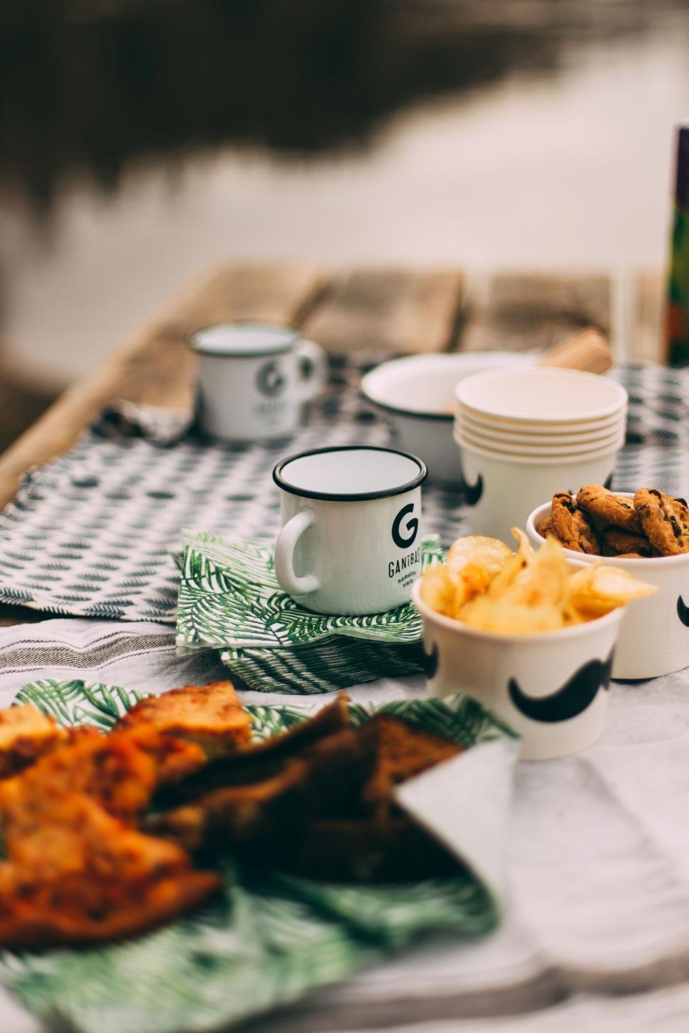 Free Image of Table Set With Plates of Food and Cups 
