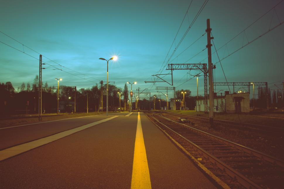 Free Image of Train Track and Street Light in Urban Setting 