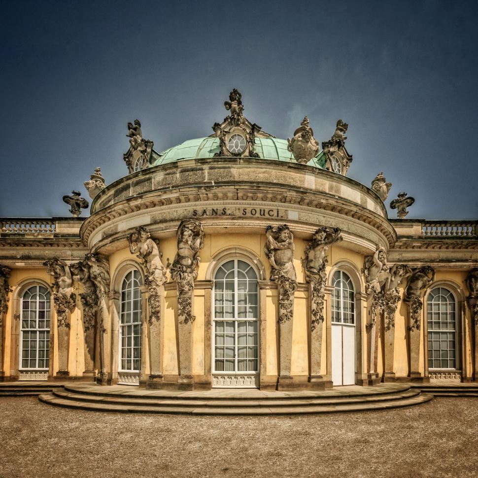 Free Image of Large Building With Statues on Top 