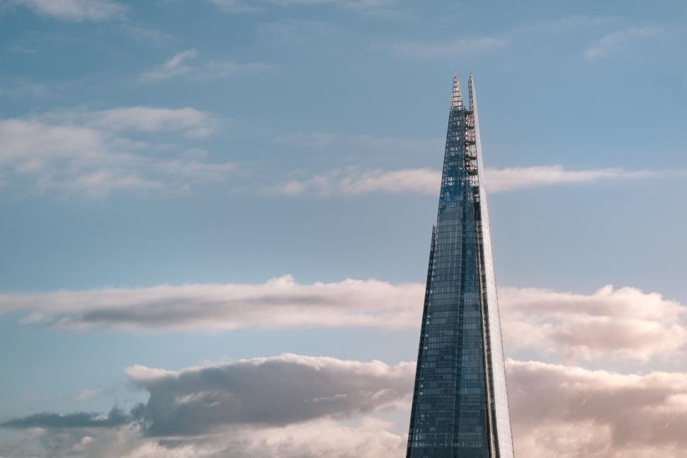 Free Image of Tall Building With Spire Reaching the Sky 