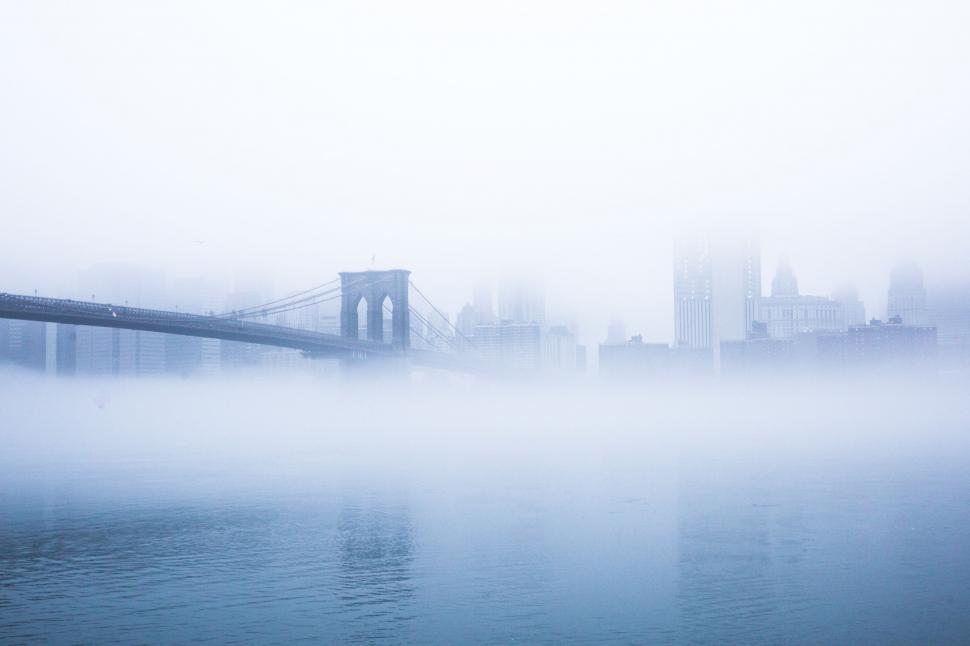 Free Image of Foggy View of Bridge and Cityscape 
