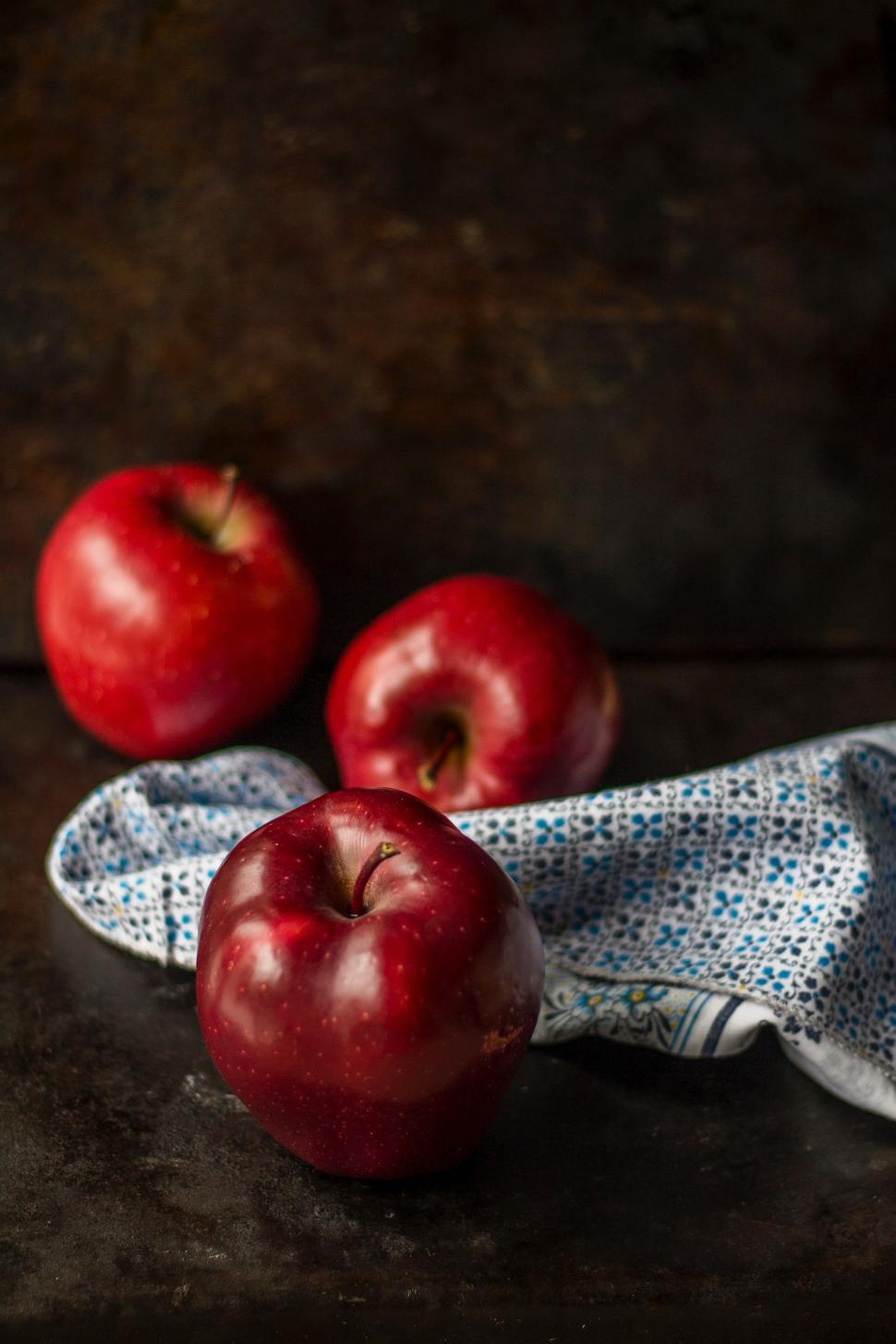 Free Image of Two Red Apples on Cloth 