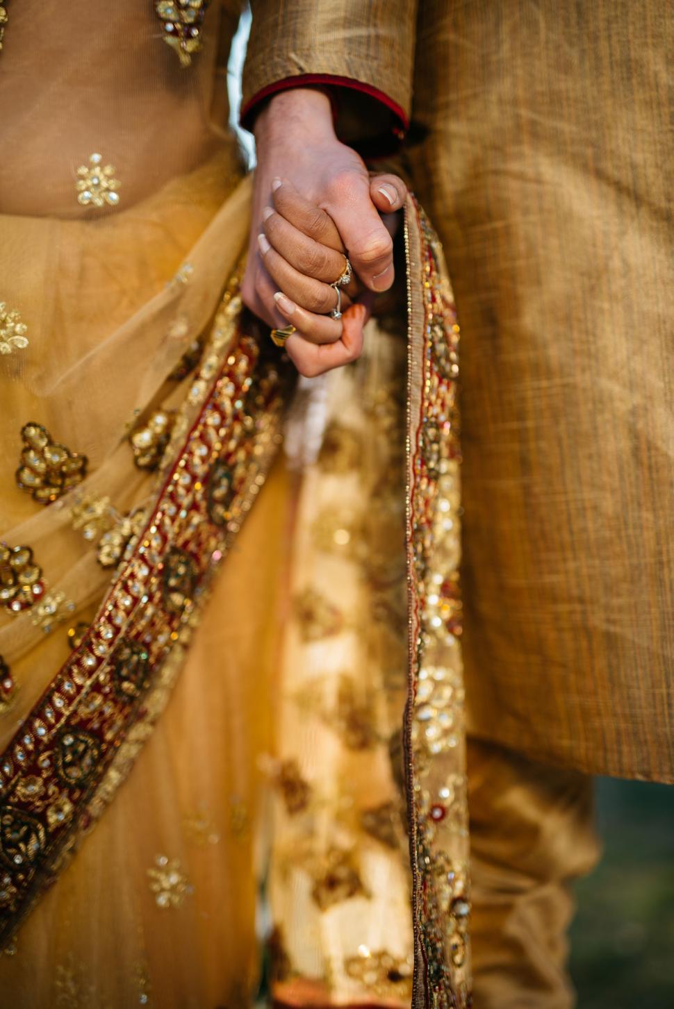 Free Image of Close-Up of Person Holding Another Persons Hand 