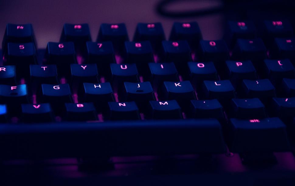 Free Image of Close Up of a Computer Keyboard With Blue Keys 