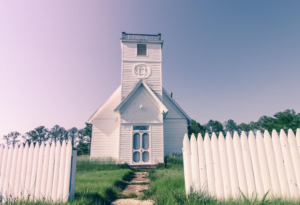 Free Image of A Church With a White Picket Fence 