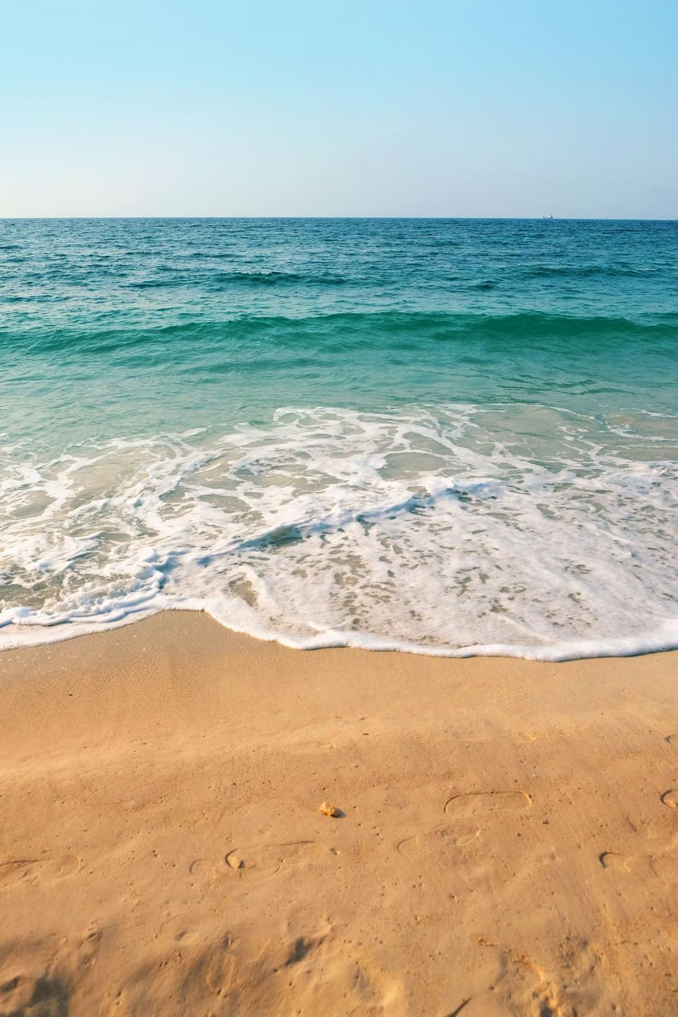 Free Image of Sandy Beach With Waves 