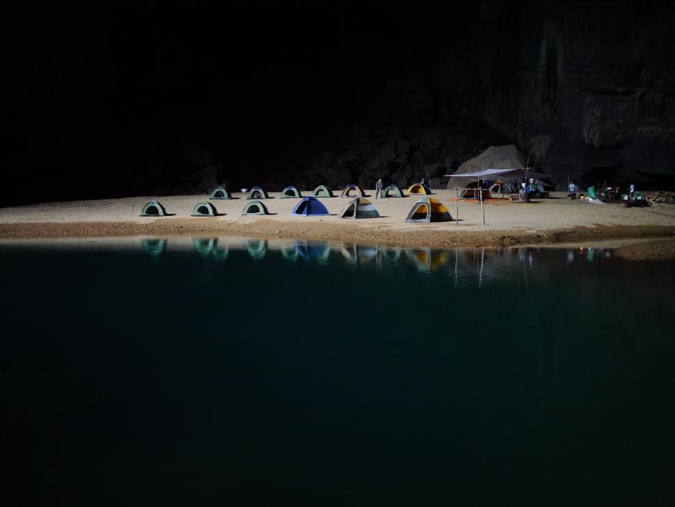 Free Image of Group of Tents on Sandy Beach 