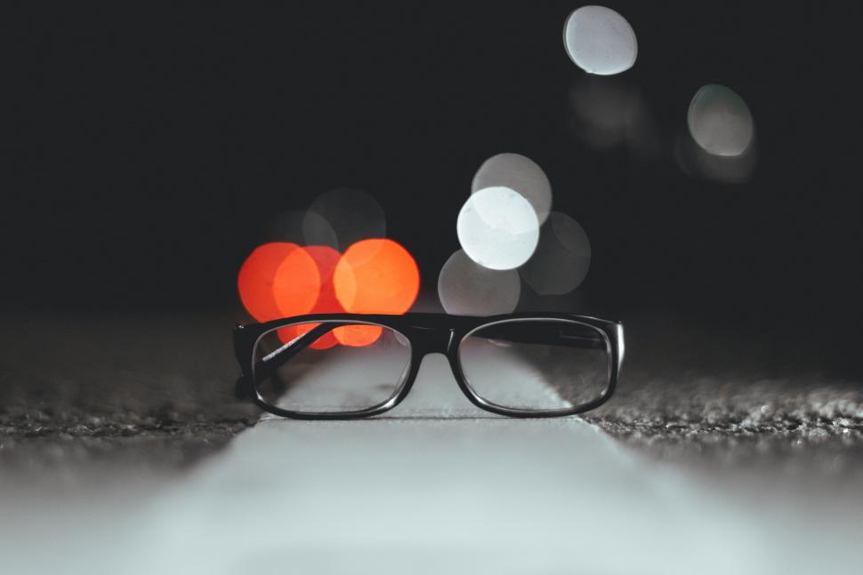 Free Image of Eyeglasses Resting on Table 