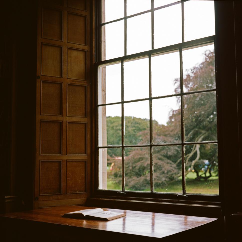 Free Image of Window With a Book on Table 