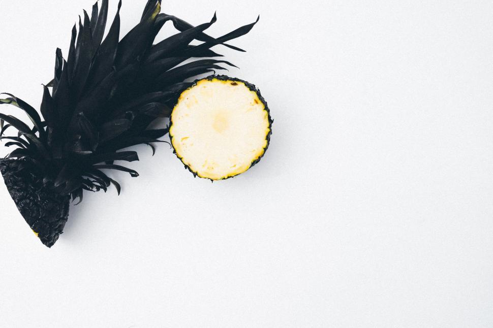 Free Image of Halved Pineapple on White Surface 