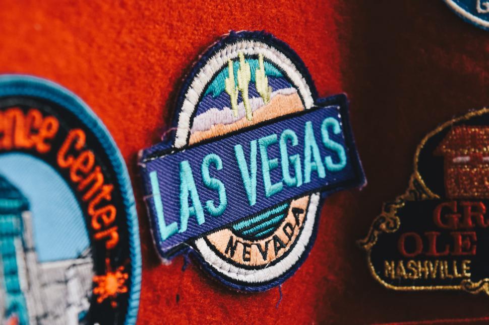 Free Image of Close Up of Patch on Red Jacket 