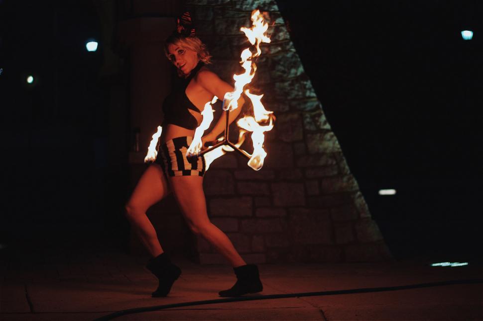 Free Image of Woman in Short Skirt Engulfed in Fire 