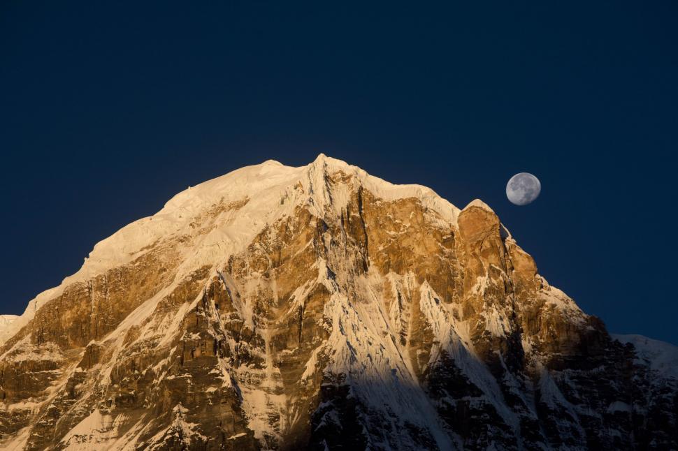 Free Image of Moon Setting Over Snowy Mountain 