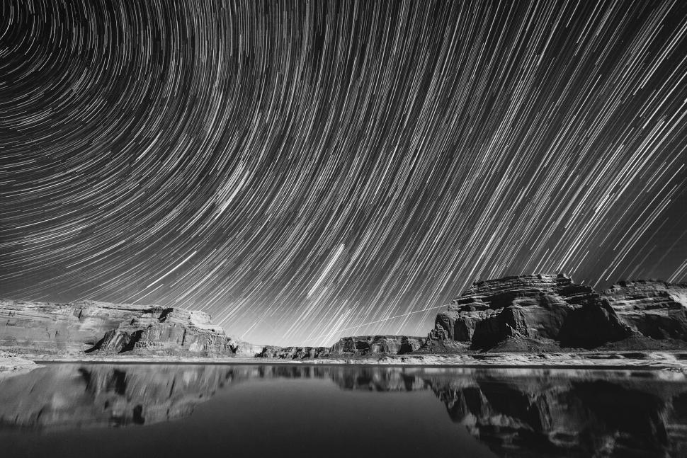Free Image of Star Trail Over Lake With Mountains 
