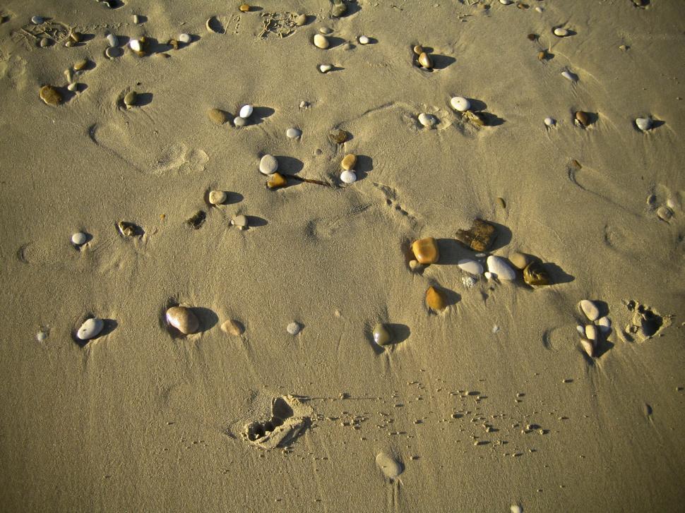 Free Image of pebbles in sand 