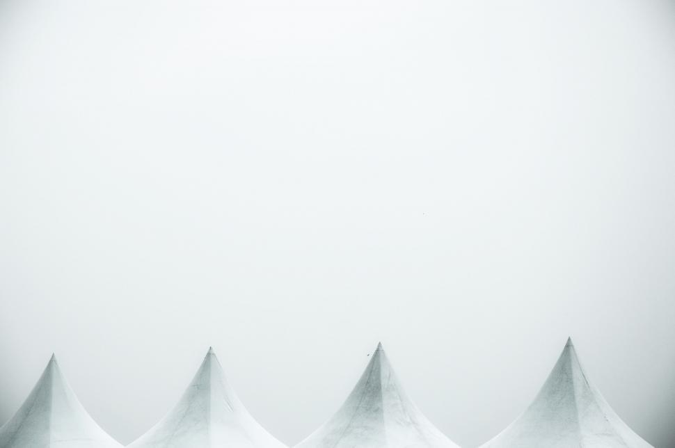 Free Image of Group of White Tents on Snow Covered Field 