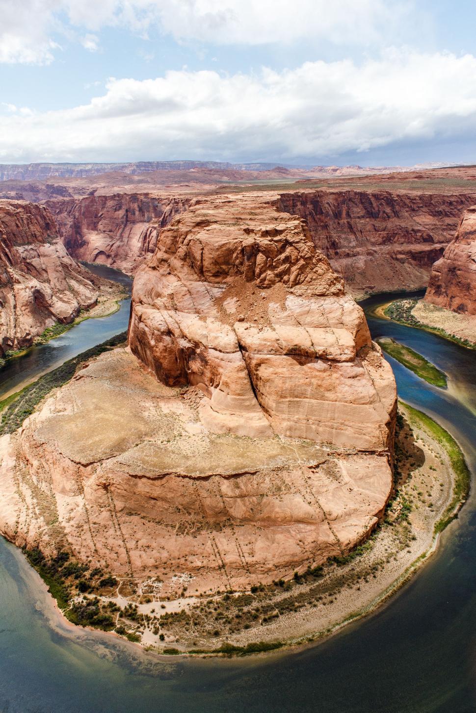 Free Image of Aerial View of River Flowing Through Canyon 