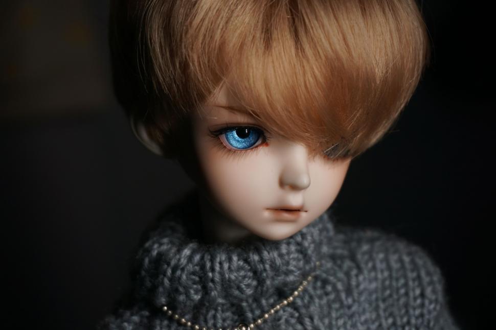 Free Image of Close Up of a Doll With Blue Eyes 