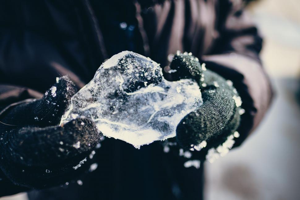 Free Image of Person Holding a Piece of Ice in Their Hands 