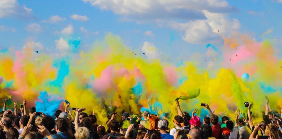 Free Image of Excited Crowd Throws Colored Powder in Air 