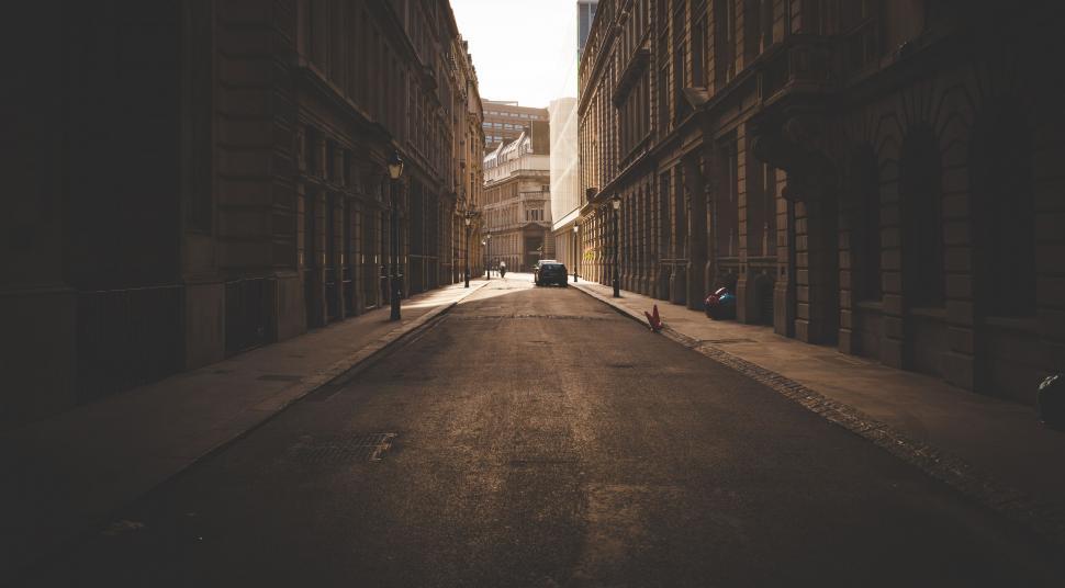 Free Image of Quiet Street With Parked Car 