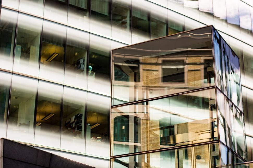 Free Image of Building Reflection in Glass Facade 