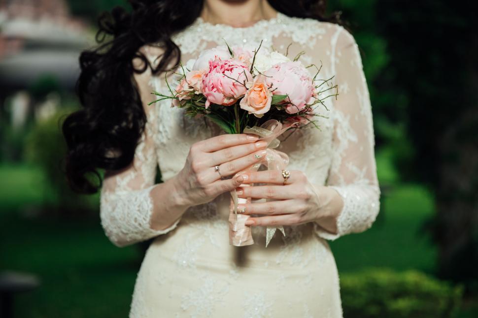 Free Image of Woman Holding Bouquet of Flowers 