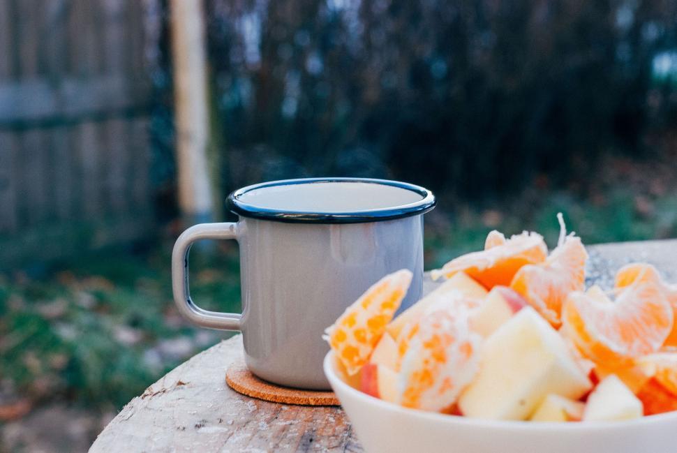 Free Image of Bowl of Fruit and Cup of Coffee on Table 